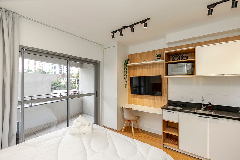 Studio Charmoso com Piscina Rooftop