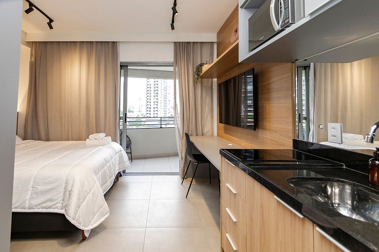 Studio Charmoso com Piscina Rooftop