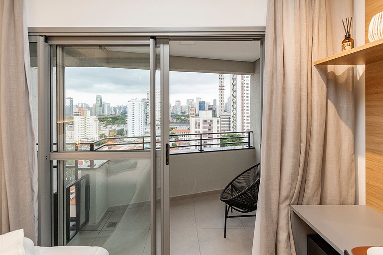 Studio Charmoso com Piscina Rooftop