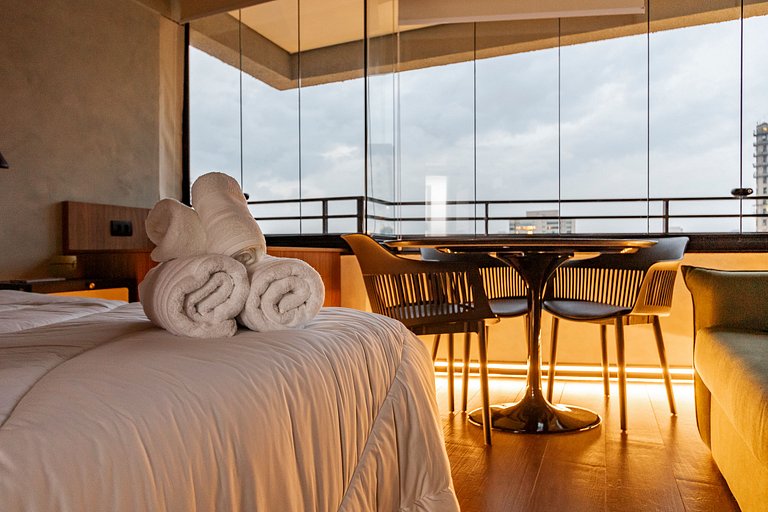 Studio Charmoso com Piscina Rooftop