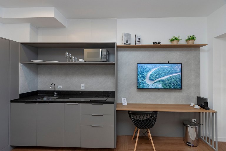 Studio Charmoso com Piscina Rooftop