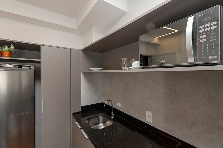 Studio Charmoso com Piscina Rooftop