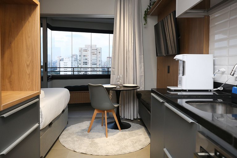 Studio Charmoso com Piscina Rooftop
