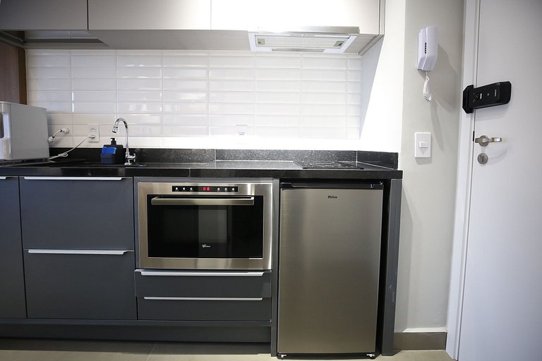 Studio Charmoso com Piscina Rooftop