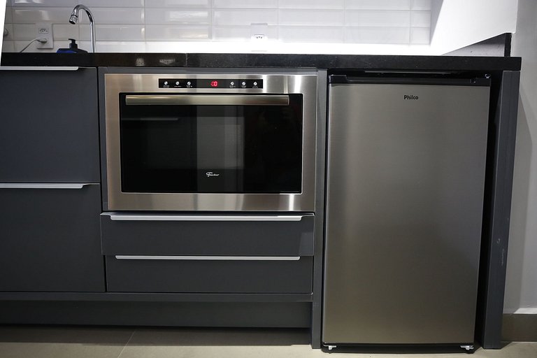 Studio Charmoso com Piscina Rooftop