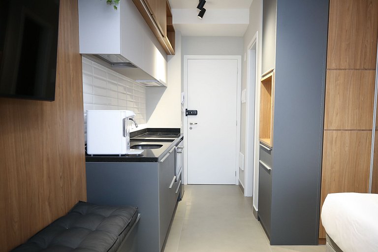 Studio Charmoso com Piscina Rooftop