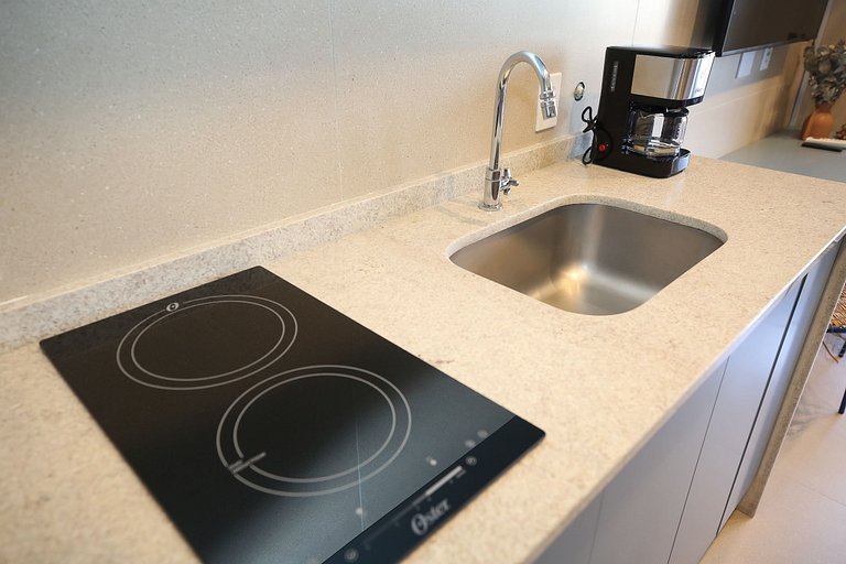 Studio Charmoso com Piscina Rooftop