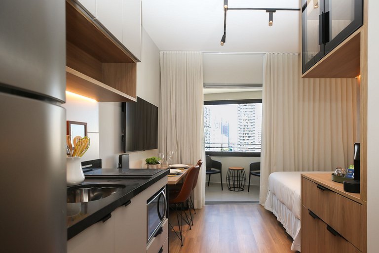 Studio Charmoso com Piscina Rooftop