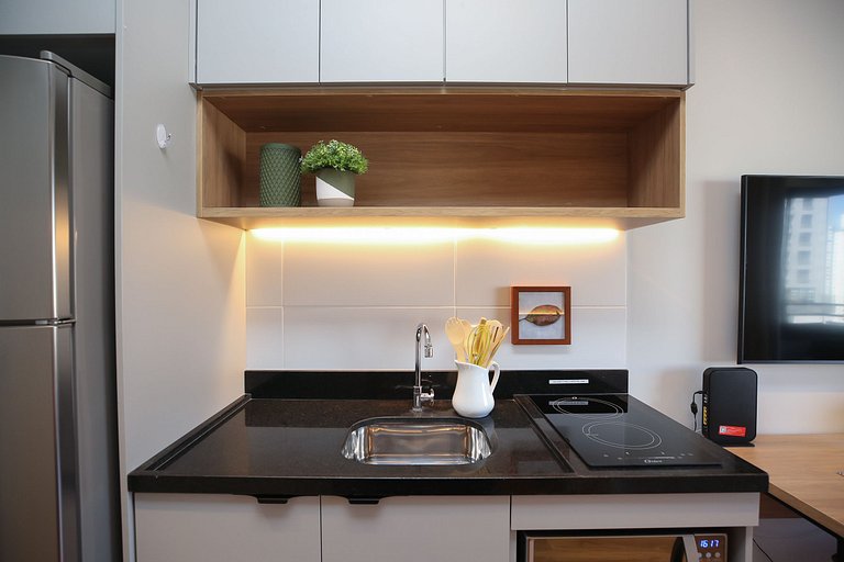 Studio Charmoso com Piscina Rooftop