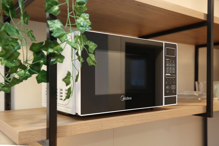 Studio Charmoso com Piscina Rooftop