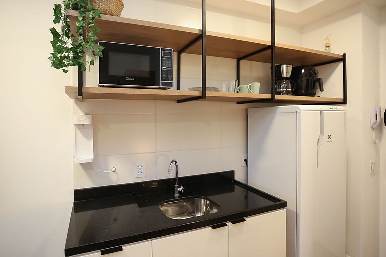 Studio Charmoso com Piscina Rooftop