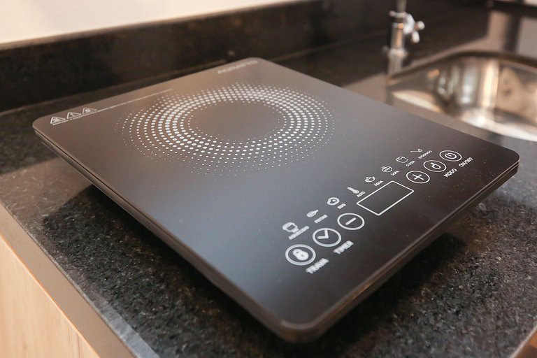 Studio Charmoso com Piscina Rooftop