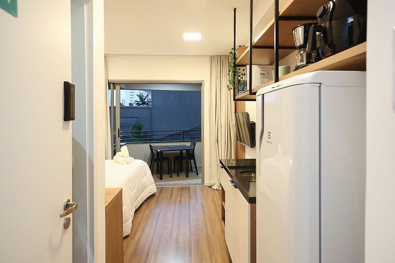 Studio Charmoso com Piscina Rooftop