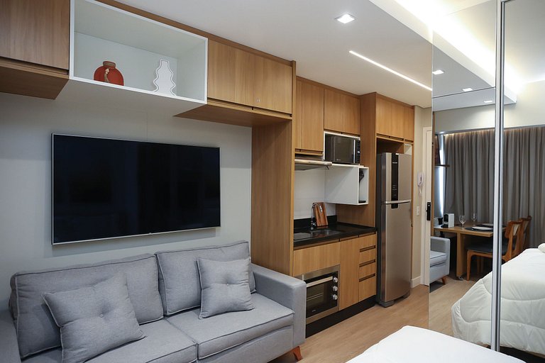 Studio Charmoso com Piscina Rooftop