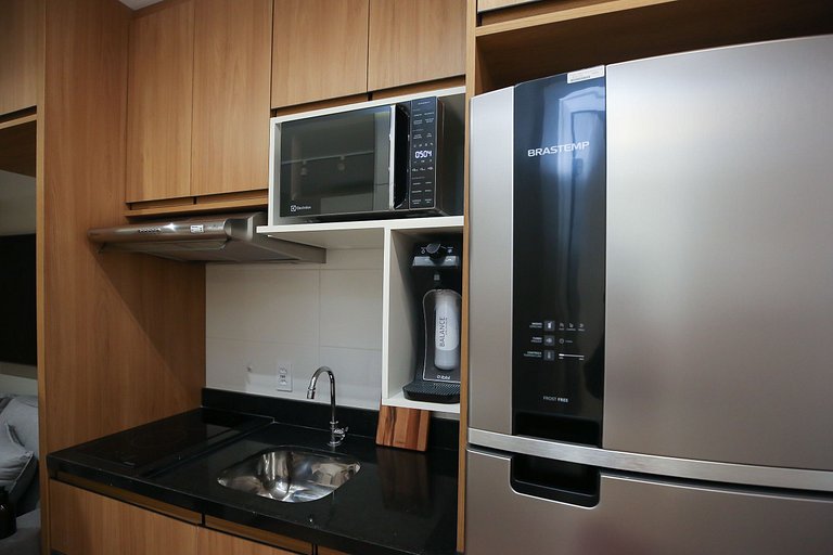 Studio Charmoso com Piscina Rooftop