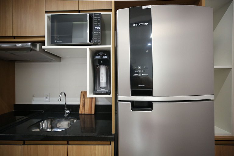 Studio Charmoso com Piscina Rooftop