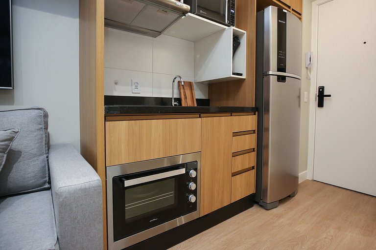 Studio Charmoso com Piscina Rooftop