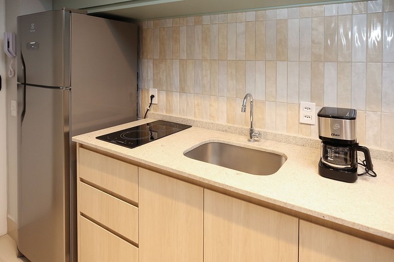 Studio Charmoso com Piscina Rooftop