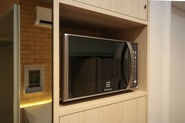 Studio Charmoso com Piscina Rooftop