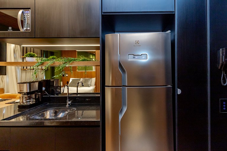 Studio Charmoso com Piscina Rooftop